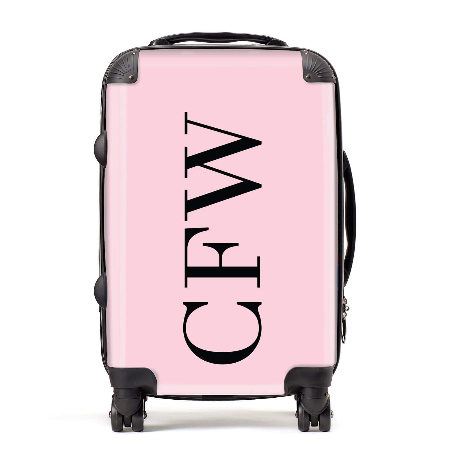 Pink and 2025 black suitcase