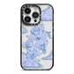 Angel Cloud Blue iPhone 14 Pro Black Impact Case on Silver phone