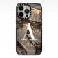 Black and Gold Marble iPhone 13 Pro Black Impact Case on Silver phone