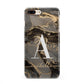 Black and Gold Marble iPhone 8 Plus 3D Snap Case on Gold Phone
