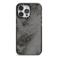 Faux Marble Grey Black iPhone 14 Pro Max Black Impact Case on Silver phone
