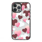 Hearts iPhone 13 Pro Max Black Impact Case on Silver phone