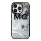 Monogram Black White Swirl Marble iPhone 14 Pro Black Impact Case on Silver phone