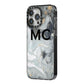 Monogram Black White Swirl Marble iPhone 14 Pro Max Black Impact Case Side Angle on Silver phone