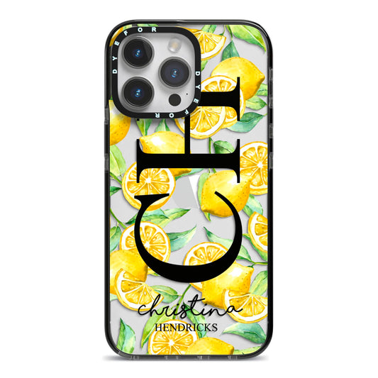 Monogrammed Lemon Fruit iPhone 14 Pro Max Black Impact Case on Silver phone