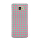 Pink Houndstooth Samsung Galaxy A5 2016 Case on gold phone