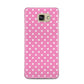 Pink Polka Dot Samsung Galaxy A5 2016 Case on gold phone