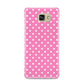 Pink Polka Dot Samsung Galaxy A9 2016 Case on gold phone