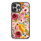 Pink and Mustard Floral iPhone 13 Pro Max Black Impact Case on Silver phone