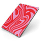 Red Swirl Apple iPad Case on Grey iPad Side View