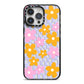 Retro Check Floral iPhone 14 Pro Max Black Impact Case on Silver phone