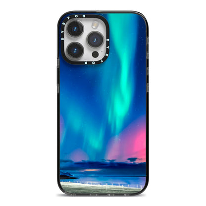 The Northern Lights iPhone 14 Pro Max Black Impact Case on Silver phone